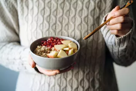 Female Eating Cereal for Breakfast